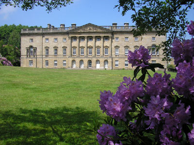 The Palladian Wing of Wentworth Castle with rhododendrons